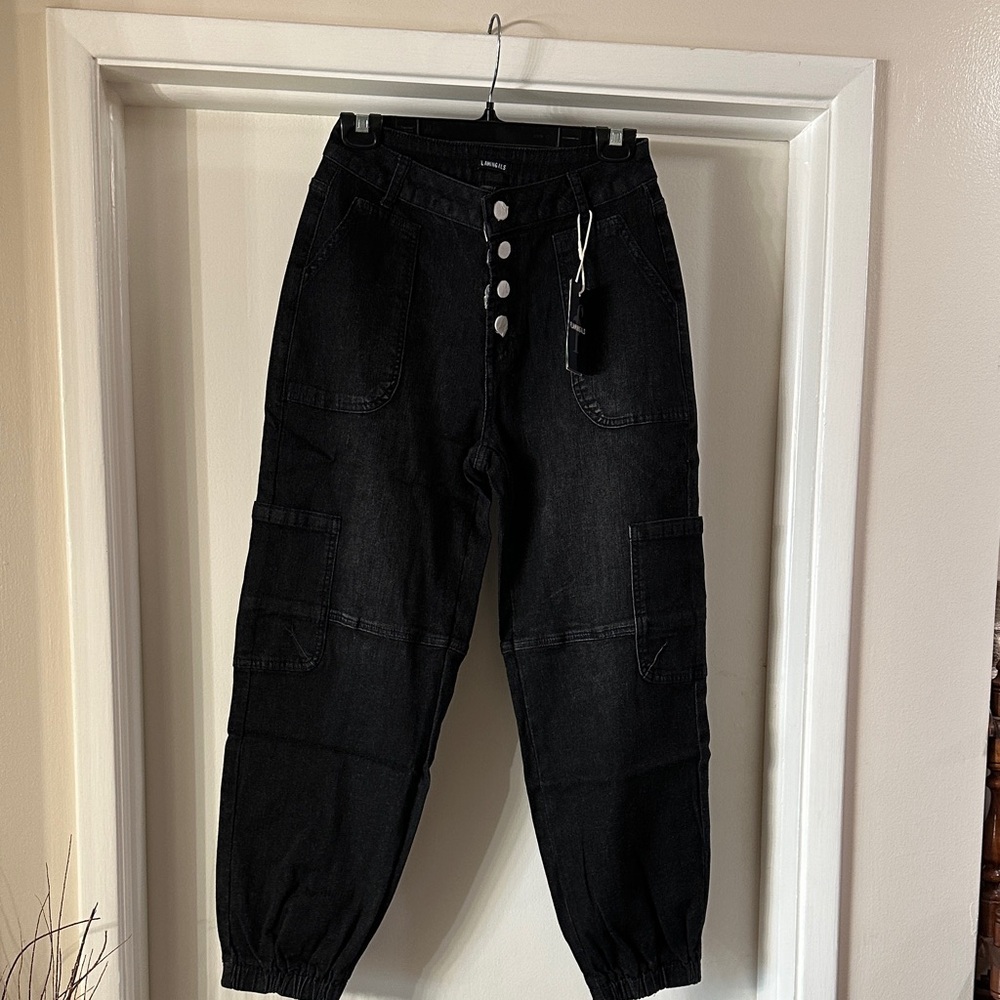 Black Track Pants by [Brand]